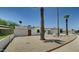 Well-maintained front yard featuring desert landscaping, a two-car garage, and a charming single-story home at 1423 W Joan De Arc Ave, Phoenix, AZ 85029