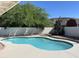 Refreshing backyard pool surrounded by lush greenery and mountain views, ideal for summer enjoyment at 1423 W Joan De Arc Ave, Phoenix, AZ 85029