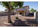 A backyard featuring desert landscaping, a patio, and a view of the home at 14552 W Hearn Rd, Surprise, AZ 85379