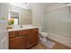 Bathroom features vanity, toilet, tub with shower and ceramic tile floors at 14552 W Hearn Rd, Surprise, AZ 85379
