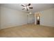 A bonus room, with neutral carpet, leading to another room at 14552 W Hearn Rd, Surprise, AZ 85379