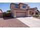 Charming two-story home featuring a two-car garage and well-maintained landscaping in a desirable neighborhood at 14552 W Hearn Rd, Surprise, AZ 85379
