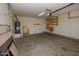 Spacious garage with built-in shelving and room for parking and storage at 14552 W Hearn Rd, Surprise, AZ 85379