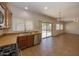 The kitchen features stainless steel appliances and overlooks a patio with sliding glass doors at 14552 W Hearn Rd, Surprise, AZ 85379