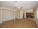 Open floor plan connecting the living room and kitchen, ideal for modern living and entertaining at 14552 W Hearn Rd, Surprise, AZ 85379