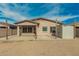 Expansive backyard featuring a covered patio and a useful outdoor storage shed at 15134 N 138Th Ln, Surprise, AZ 85379