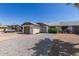 Well-kept home with a single-car garage, driveway, and low maintenance landscaping at 1633 E Beverly Ln, Phoenix, AZ 85022