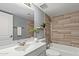 Modern bathroom featuring sleek fixtures, contemporary design, and a well-lit vanity at 1730 W Emelita Ave # 2027, Mesa, AZ 85202