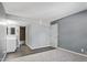 This bedroom has carpet, neutral paint and an attached bathroom at 1730 W Emelita Ave # 2027, Mesa, AZ 85202