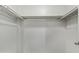 The closet has shelving, storage, and a white interior at 1730 W Emelita Ave # 2027, Mesa, AZ 85202
