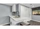 Cozy Kitchenette featuring quartz countertops, modern fixtures and a stainless sink at 1730 W Emelita Ave # 2027, Mesa, AZ 85202