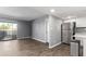 Open floor plan showcases the living room, balcony, and modern kitchen at 1730 W Emelita Ave # 2027, Mesa, AZ 85202