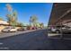 Covered parking area, offering shaded parking. Cars parked in the background at 1730 W Emelita Ave # 2027, Mesa, AZ 85202
