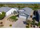 An aerial view of a beautifully landscaped home highlighting a well-maintained yard and welcoming facade at 17362 W Wildwood St, Surprise, AZ 85388