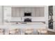 Stylish kitchen with a spacious island, stainless steel appliances, and sleek cabinetry for a modern look at 17362 W Wildwood St, Surprise, AZ 85388