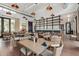 Elegantly appointed restaurant with tables set for dining, featuring warm lighting at 17362 W Wildwood St, Surprise, AZ 85388