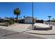 Well-maintained home showcasing desert landscaping, a paved driveway, and a convenient street corner location at 17415 N 57Th Ave, Glendale, AZ 85308