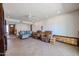 Spacious living room with tile floors, comfortable seating, and ample natural light at 17415 N 57Th Ave, Glendale, AZ 85308
