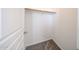 Narrow bedroom closet features shelving, carpet and white walls to keep your belongings organized at 17681 W Molly Ln, Surprise, AZ 85387