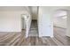 Staircase features carpeted stairs and white railing at 17681 W Molly Ln, Surprise, AZ 85387