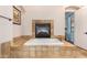 Bathroom with a soaking tub and a fireplace at 18226 W Marshall Ct, Litchfield Park, AZ 85340