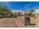 Elegant home featuring desert landscaping and a decorative fountain at 18226 W Marshall Ct, Litchfield Park, AZ 85340