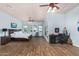 Large main bedroom features wood floors, two ceiling fans, and plenty of natural light at 18226 W Marshall Ct, Litchfield Park, AZ 85340