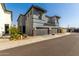 Attractive two-story home with a gray stucco exterior and attached two-car garage at 1829 N 43Rd Ter, Phoenix, AZ 85008