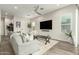Stylish living room featuring neutral tones, modern decor, and hardwood floors at 1829 N 43Rd Ter, Phoenix, AZ 85008