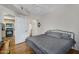 Cozy bedroom showcasing a metal bed frame, ceiling fan, and connecting doorways at 18416 N Cave Creek Rd # 3034, Phoenix, AZ 85032