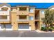 Inviting condo featuring balconies, garage, and convenient stair access to upper units at 18416 N Cave Creek Rd # 3034, Phoenix, AZ 85032