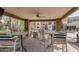 Community outdoor kitchen with bar seating and a view of the pool at 18416 N Cave Creek Rd # 3034, Phoenix, AZ 85032