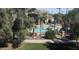 Community pool surrounded by lush greenery, offering a private retreat at 18416 N Cave Creek Rd # 3034, Phoenix, AZ 85032