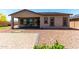 Charming patio and manicured gravel landscaping complete this beautiful backyard at 18508 W Galveston St, Goodyear, AZ 85338
