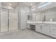 En Suite bath featuring a glass-enclosed shower and dual vanities with ample counter space at 18508 W Galveston St, Goodyear, AZ 85338