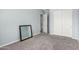 Spacious bedroom featuring neutral walls, plush carpeting, closet and modern trim at 18508 W Galveston St, Goodyear, AZ 85338