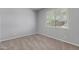 Cozy bedroom with neutral walls, plush carpeting, and a window providing natural light at 18508 W Galveston St, Goodyear, AZ 85338