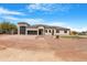An inviting single-Gathering home featuring desert landscaping and a three-car garage at 19622 W Pasadena Ave, Litchfield Park, AZ 85340