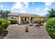 Charming backyard with gravel landscaping, covered patio, and space for outdoor living at 20140 N 269Th Dr, Buckeye, AZ 85396