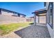 Backyard featuring low-maintenance landscaping and a private block fence at 20808 W Granada Rd, Buckeye, AZ 85396
