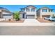 Two-story home featuring a two-car garage and neutral color scheme at 20808 W Granada Rd, Buckeye, AZ 85396