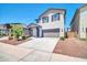 Charming two-story home with a well-maintained front yard and a two-car garage at 20808 W Granada Rd, Buckeye, AZ 85396