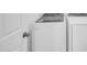 Clean laundry room featuring a side-by-side washer and dryer for convenience at 20808 W Granada Rd, Buckeye, AZ 85396