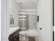 Cozy bathroom with a shower-tub, modern sink, and neutral tones at 2236 E Rawhide St, Gilbert, AZ 85296