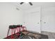 A home gym offers convenience with weight lifting equipment and storage inside a room at 2236 E Rawhide St, Gilbert, AZ 85296