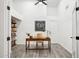 Bright home office space offering great natural light, built-in shelves, a desk, and modern finishes at 2236 E Rawhide St, Gilbert, AZ 85296
