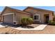 Inviting single-Gathering home with a 2-car garage, manicured landscaping, and a cozy front porch at 22745 W Cocopah St, Buckeye, AZ 85326