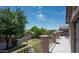 Balcony view of a well-maintained backyard and neighborhood at 2307 W Sienna Bouquet Pl, Phoenix, AZ 85085