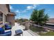 Spacious balcony overlooking a landscaped yard with comfortable seating area at 2307 W Sienna Bouquet Pl, Phoenix, AZ 85085