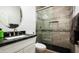 Modern bathroom with sleek walk-in shower, updated vanity, and stylish fixtures at 2307 W Sienna Bouquet Pl, Phoenix, AZ 85085